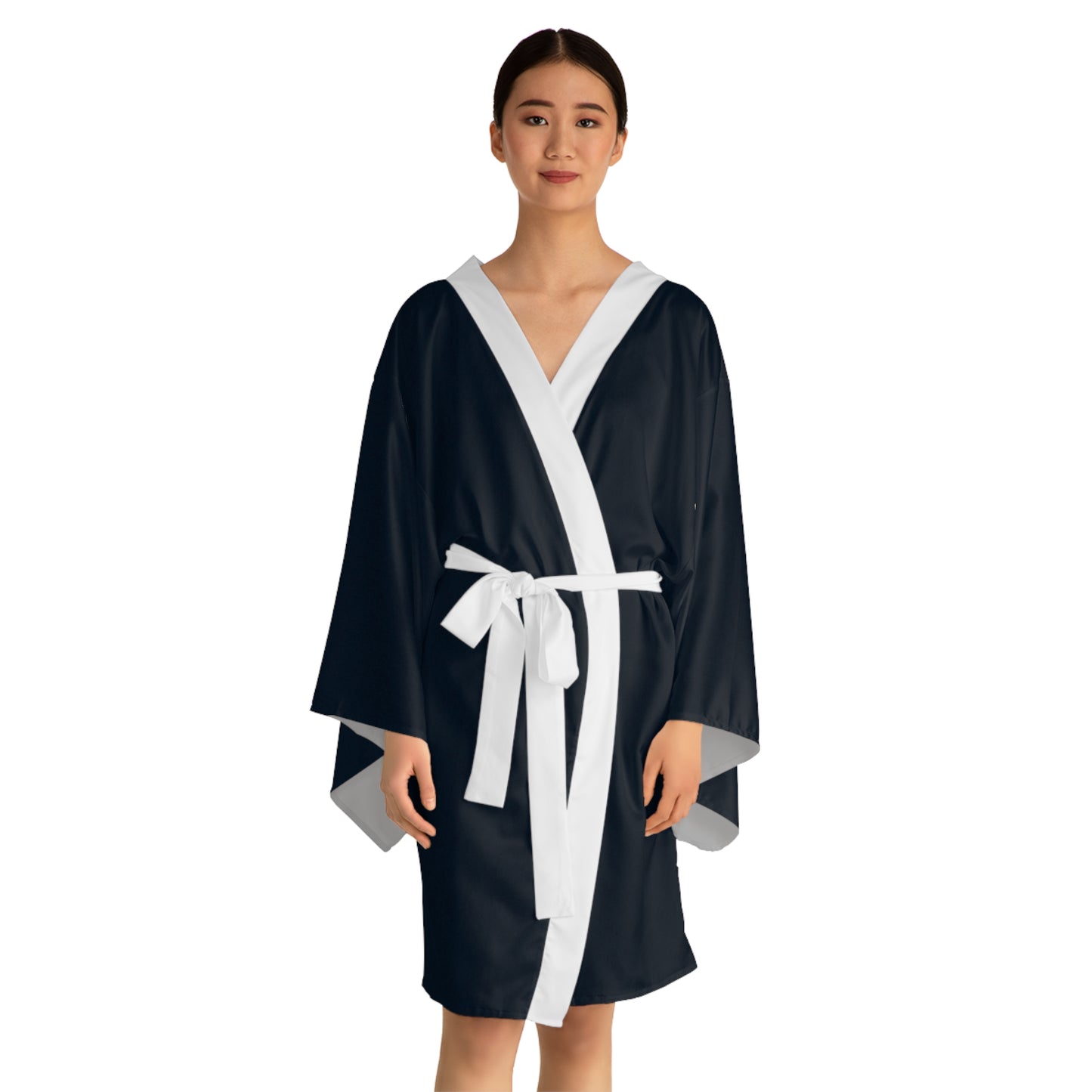 A close-up graphic of a metallic gold zipper opening up dark navy denim fabric - kimono robe