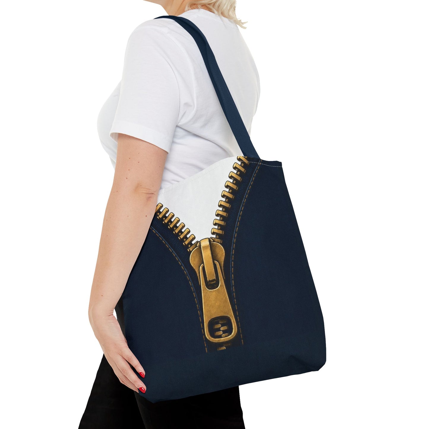 A close-up graphic of a metallic gold zipper opening up dark navy denim fabric - tote bag