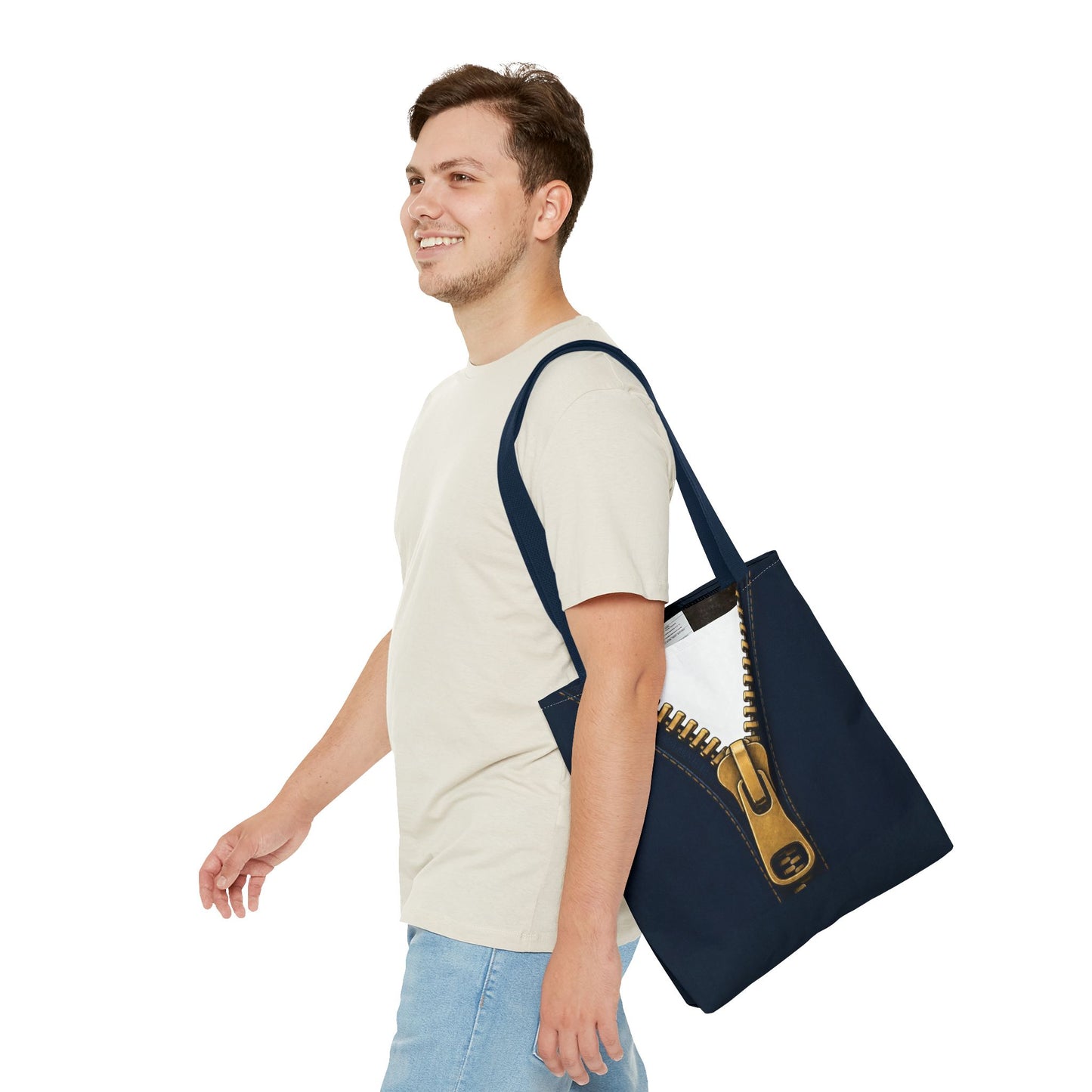A close-up graphic of a metallic gold zipper opening up dark navy denim fabric - tote bag