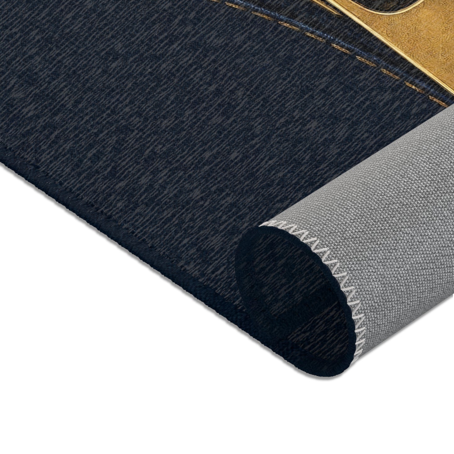 A close-up graphic of a metallic gold zipper opening up dark navy denim fabric - area rug