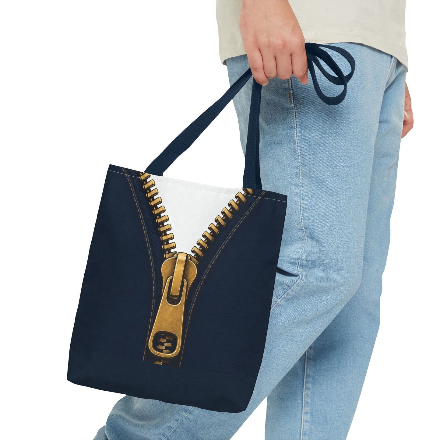 A close-up graphic of a metallic gold zipper opening up dark navy denim fabric - tote bag